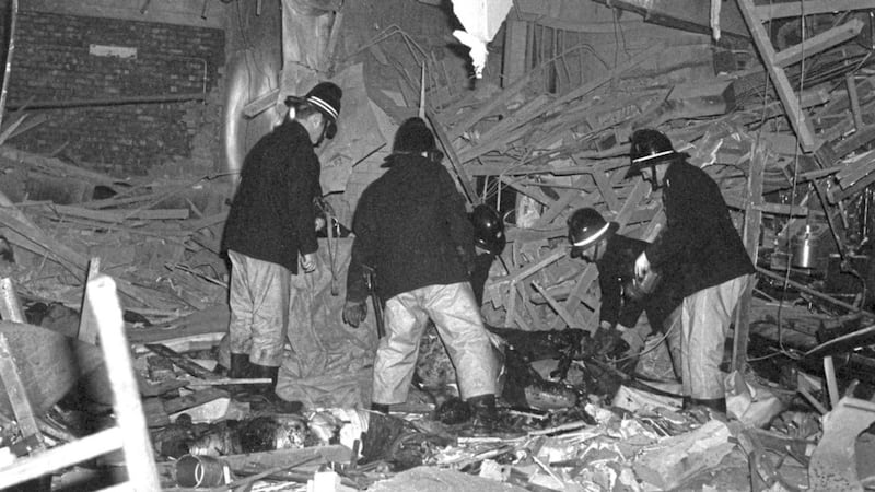 Firemen at work following the bomb attacks in Birmingham city centre that targeted the Mulberry Bush pub and the Tavern in the Town. Picture by PA 