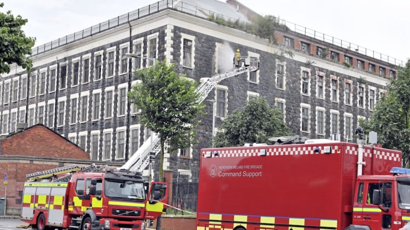 Northern Ireland Fire and Rescue Service dealing with a major fire at the old Ewarts Mill complex in north Belfast.   