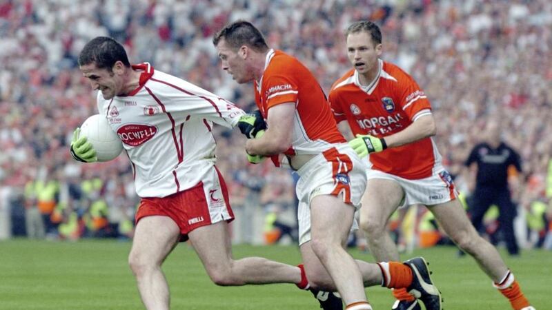 2005 Footballer of the Year Stephen O'Neill will help coach Tyrone's forwards next year.