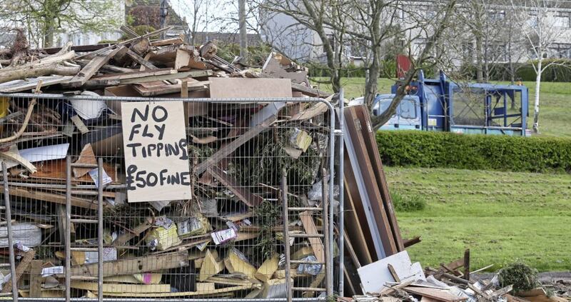 Fly-tipping signs last year at the loyalist bonfire site at Milltown Hill near Shaws Bridge. Picture by Mal McCann 