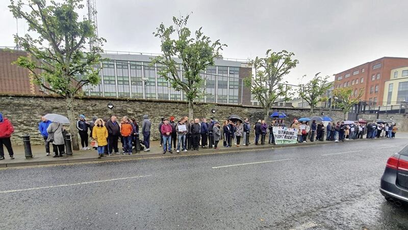 Members of Sinn F&eacute;in protesting at the arrest of party member Sadie Callan. 