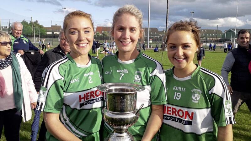 Eimhear McAleenan (left) with her sisters Caoimhe and &Uacute;na after the Antrim final win over St Paul&#39;s. 