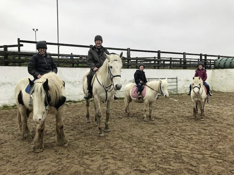 Jenny Lee and family saddled up for horse trekking in Armoy 