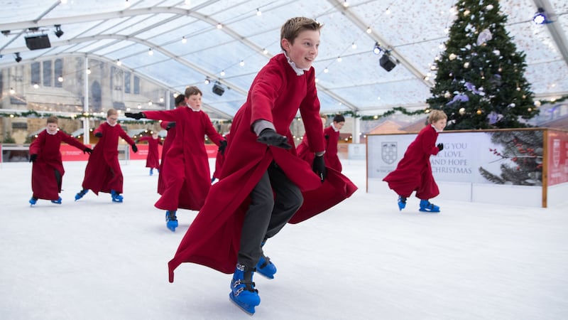 A covered ice rink has opened next to Winchester Cathedral.