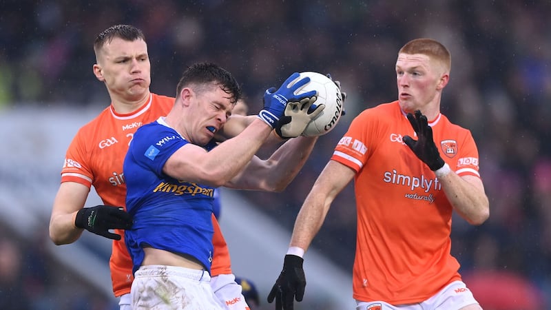 Rian O'Neill (left) made an important defensive intervention when introduced for Armagh in their Ulster SFC quarter-final against Cavan at Kingspan Breffni on Saturday evening