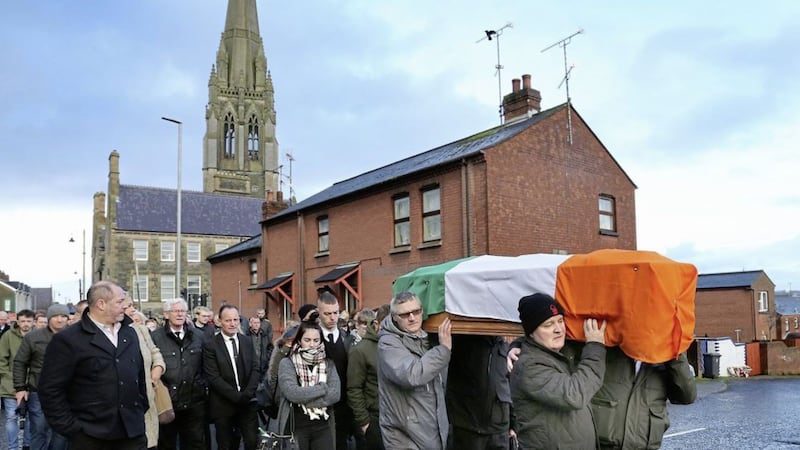 The remains of Derry murder victim Eddie Meenan are carried past the spot where he was murdered two weeks ago. Picture by Margaret McLaughlin 