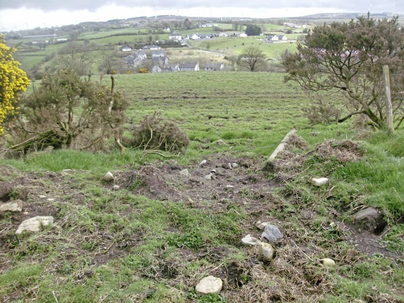 The bank where the spy cameras, a transmitter and power pack were dug in on the ridge of a hill overlooking Kelly&#39;s Inn, which can be seen in the distance 