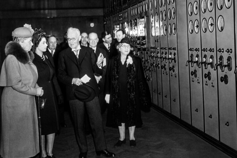 A young Princess Elizabeth and her grandmother Queen Mary are joined by several dignitaries who are shown around Control Room A, during a state visit in April 1946 (Simon Webster/Alamy/PA)