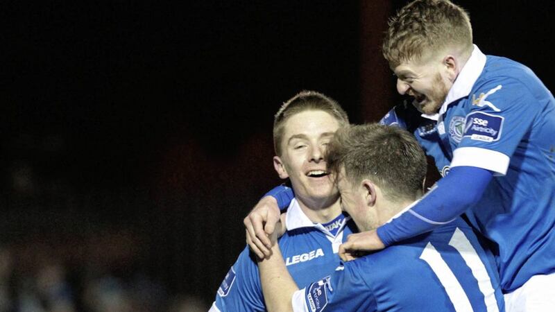 Ryan Curran of Finn Harps celebrates his goal against Derry City, mobbed by Tony McNamee and Adam Hanlon during a League match at Finn Park, Ballybofey. Picture by Margaret McLaughlin. 