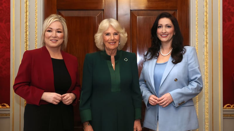 Queen Camilla (centre) with First Minister Michelle O'Neill (left) and Deputy First Minister Emma Little-Pengelly (right) as  she attends an event hosted by the Queen's Reading Room to mark World Poetry Day at Hillsborough Castle in Belfast, during her two-day official visit to Northern Ireland. Picture Liam McBurney/PA Wire