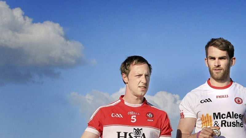 Attending the launch of the Ulster GAA Senior Football Championship in Derry recently were Neil Forrester from Derry with Ronan McNamee of Tyrone Picture Margaret McLaughlin  