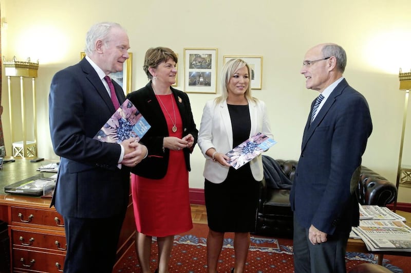 Then First Minister Arlene Foster and Deputy First Minister Martin McGuinness along with Health Minister Michelle O'Neill with Professor Rafael Bengoa, author of a report on healthcare reform