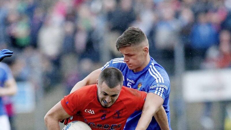 Ardboe&#39;s Shay McGuigan and Coalisland &#39;s Michael McKernan (right) in action last season. McKernan thinks Donegal should host their Championship match with Tyrone Picture: Philip Walsh. 