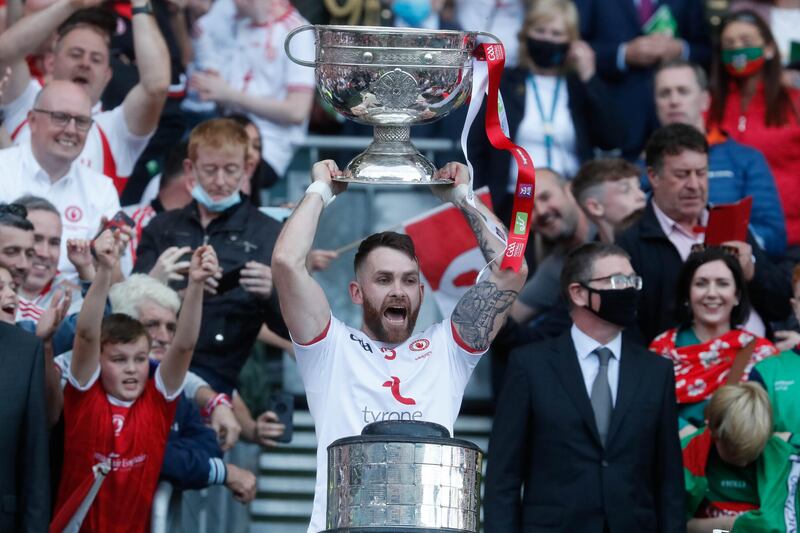Tyrone's Ronan McNamee lifts the Sam Maguire Cup in 2021.