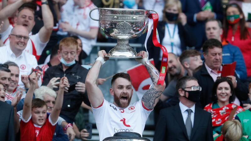 Tyrone's Ronan McNamee lifts the Sam Maguire Cup in 2021.