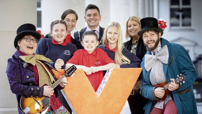 Lord Mayor Daniel Baker, Young At Art director Eibhlin De Barra and Gilly Campbell of the Northern Ireland Arts Council join The Bowties and young friends to launch the Belfast Children&rsquo;s Festival 2020. Picture by Brian Morrison 