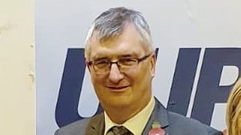 Tom Elliott said he spoke to traders who did not want to see election posters in town centres during the festive period