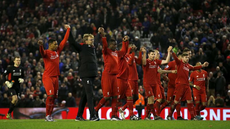 Liverpool&nbsp;manager Jurgen Klopp (second left) celebrates with his players in front of the Kop after grabbing a late draw against West Brom