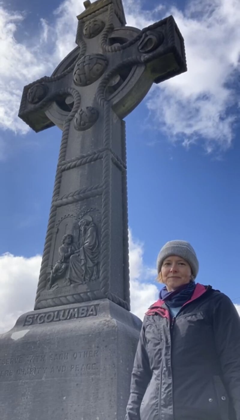 Anne Madden pictured in Co Donegal beside cross, erected by Cornelia Adair, one of the characters in her historical fiction novel The Wilderness Way