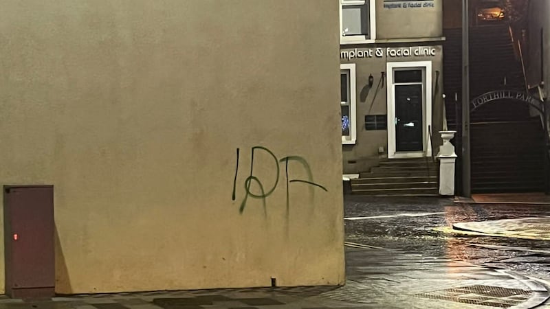 Graffiti was sprayed on a wall in Enniskillen (DUP/PA)