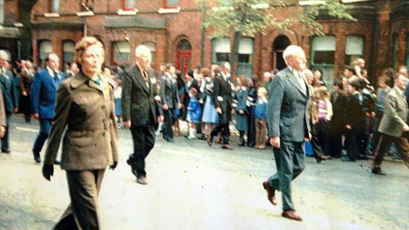 M&aacute;ire Drumm and Liam Wiggins march on the Falls Road during the fiftieth anniversary of the Easter Rising in 1966 