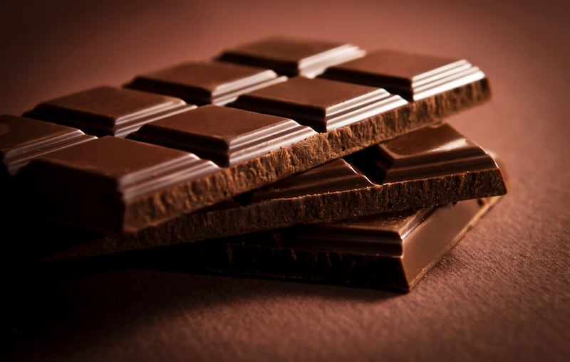 Chocolate bar on dark brown background (mchebby/Getty/PA)