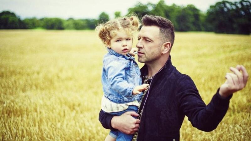 Westlife star Mark Feehily pictured with his daughter, Layla, who was born by surrogacy in the US two years ago. Mr Feehily has joined a campaign which is calling on the Irish Government to introduce legislation to regulate surrogacy 