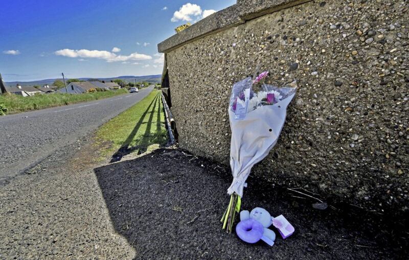 Flowers and tributes at the scene in Ballycastle. Picture by Hugh Russell 
