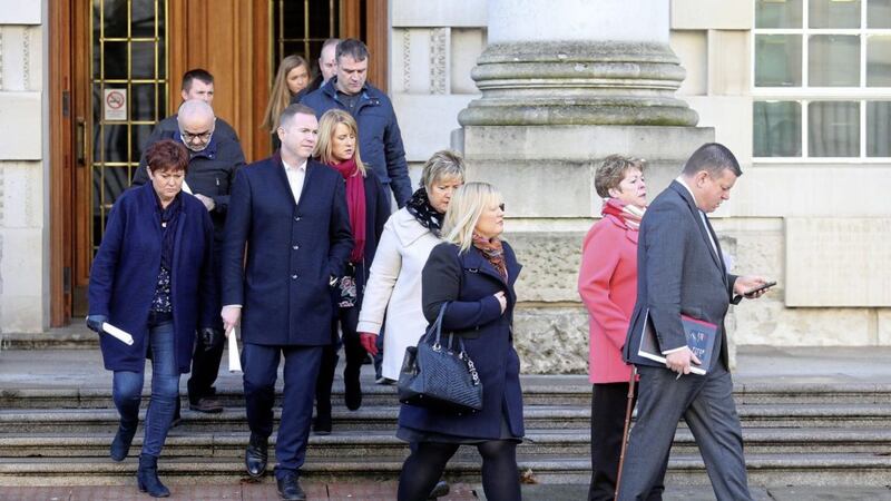 Emma Rogan (daughter of Daughter of Adrian Rogan) with other families and supporters of the Loughanisland massacre at Belfast High Court on Friday. Picture by Mal McCann 