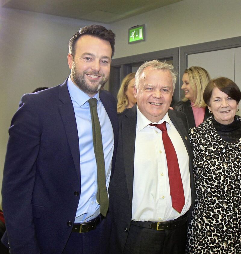 John Dallat with his wife Anne and SDLP leader Colum Eastwood. Picture by Margaret McLaughlin 