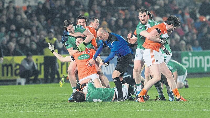 Referee Cormac Reilly in the thick of exchanges between Armagh and Fermanagh on Saturday night&nbsp;Picture: Colm O&rsquo;Reilly