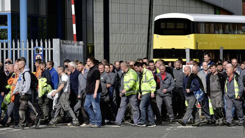 Workers at Wrightbus in Ballymena leave after the company entered administration in September. Picture by Colm Lenaghan 