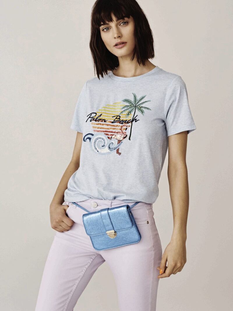 Oasis Palm Beach Tee, &pound;25; Lilac Isabella Jeans, &pound;45; Metallic Blue Belt Bag, &pound;26, available from Oasis (bag available in June) 