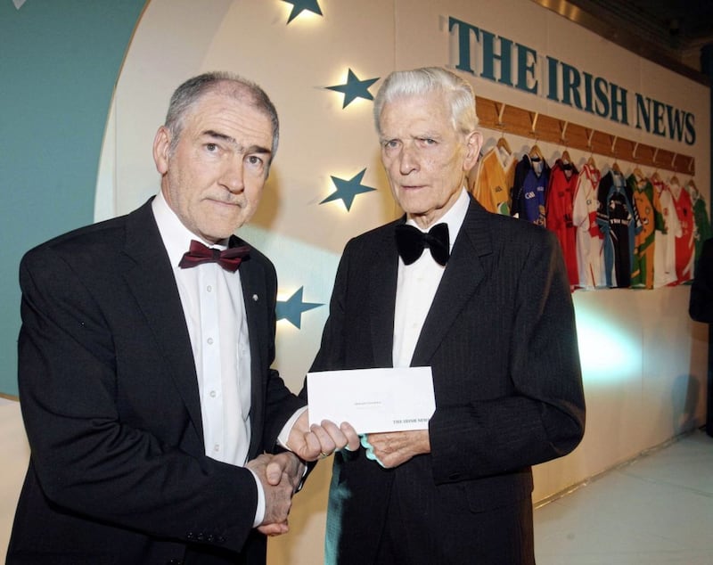 Tyrone football manager Mickey Harte receiving a cheque from Irish News chairman Jim Fitzpatrick for the Michaela Foundation at the 2011 Irish News Ulster All-Stars at Armagh City Hotel. Picture by Colm O&#39;Reilly 