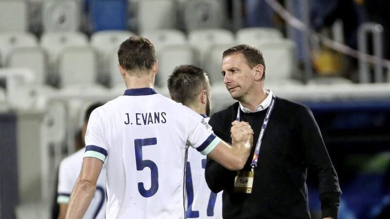 Jonny Evans with Northern Ireland manager Ian Baraclough after the 3-2 defeat away to Kosovo. 