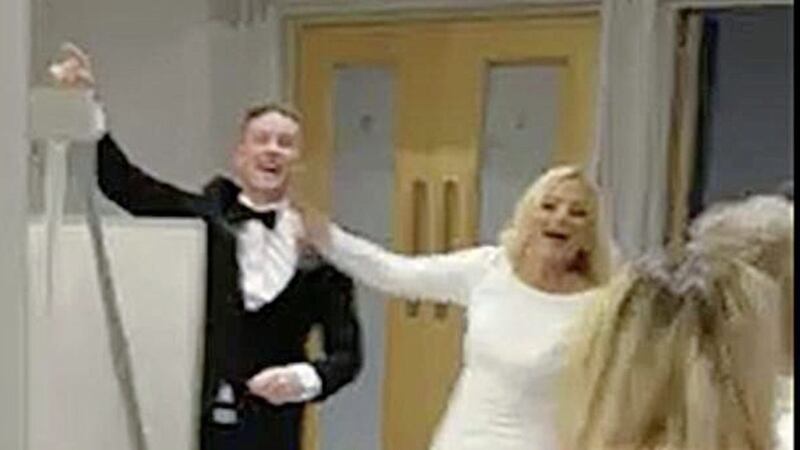 The newlyweds were filmed singing `F*** the Pope and the IRA&#39; as they entered their wedding reception to the UDA-associated song Simply The Best at the Loughshore Hotel in Carrickfergus. 