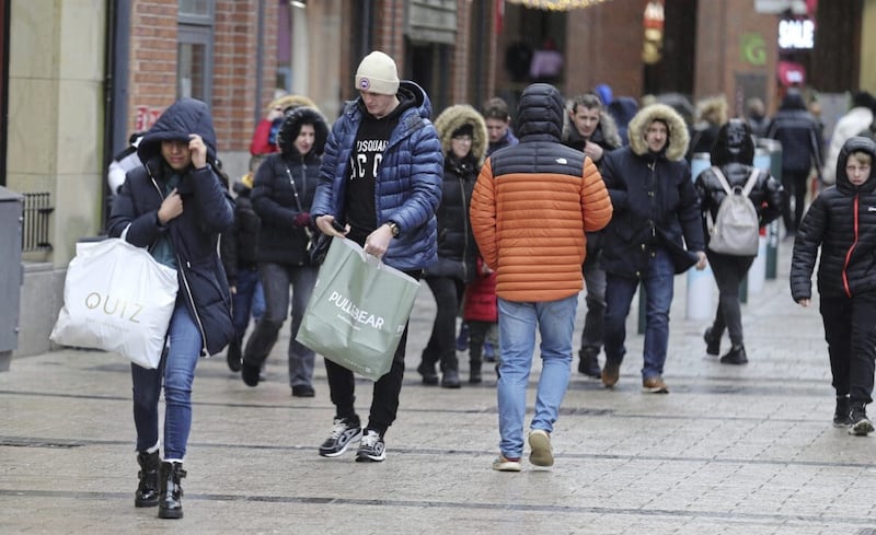 Christmas shoppers in Belfast. The latest credit union survey suggests retailers are in for a difficult period. Picture by Hugh Russell. 