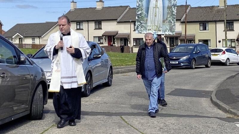 Fr Joe Gormley (pictured) and Fr Daniel McFaul walked through the streets of Creggan reciting the rosary for the Feast of Our Lady of Fatima 