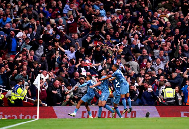 Aston Villa’s Leon Bailey (left) celebrates in front of the fans
