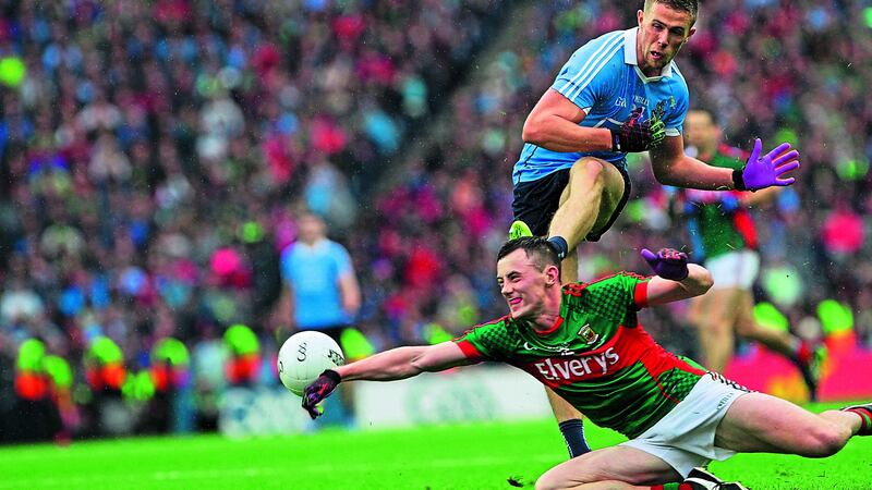 &nbsp;Dublin substitute Paul Mannion tries to get a shot away despite the attentions of Mayo&rsquo;s Diarmuid O&rsquo;Connor during yesterday&rsquo;s drawn All-Ireland final at Croke Park. &nbsp; Picture by Colm O&rsquo;Reilly