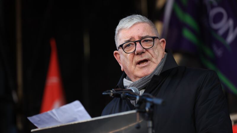 Gerry Murphy, Assistant General Secretary of the Irish Congress of Trade Unions, addresses union members outside Belfast City Hall, Belfast, as an estimated 150,000 workers take part in walkouts over pay across Northern Ireland. The strike is set to have a major impact with schools closed, hospitals offering only Christmas Day-level services, public transport cancelled as well as limited gritting of the roads in zero-degree temperatures. Picture date: Thursday January 18, 2024.