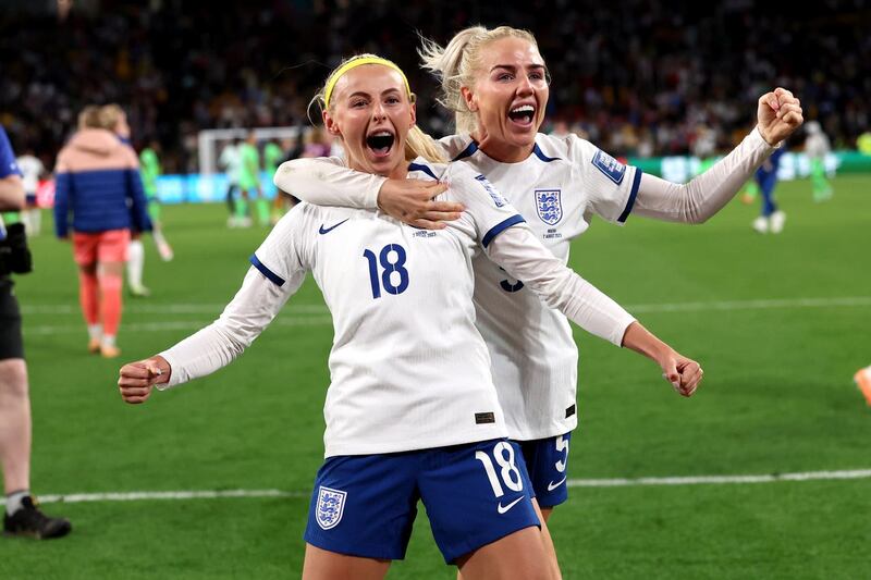 Chloe Kelly and Alex Greenwood celebrate England's shoot-out success 