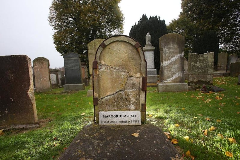 Museum worker David Weir thinks the headstone may be the work of opportunistic stonemason. Picture by Mal McCann