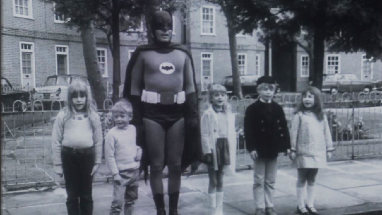The clip shows the Caped Crusader teaching children the Green Cross Code.