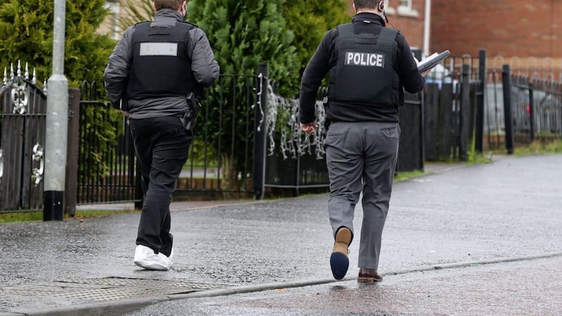 Police at the scene of an overnight shooting in Hazel Glen in west Belfast Picture Mal McCann. 