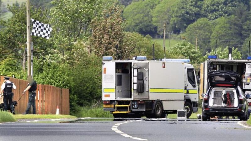 Bomb disposal experts at the scene of a security alert on the main Derry to Belfast road close to Foreglen on Wednesday. Picture by Margaret McLaughlin 