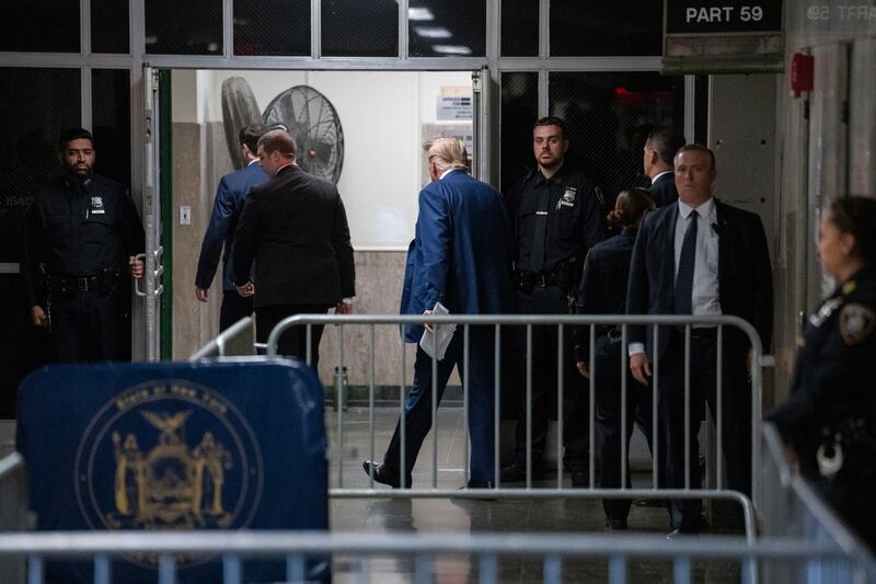 Former US president Donald Trump exits the courtroom during a break at Manhattan criminal Court in New York (Jeenah Moon/Pool Photo via AP)