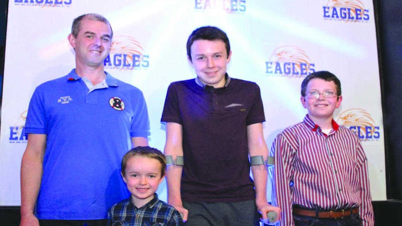 Alan Hawe with sons Ryan (6), Liam (13) and Niall (11) pictured in May this year. 