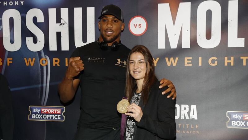 Katie Taylor with Anthony Joshua during Thursday's press conference at the Radisson Hotel in Manchester<br />Picture by PA