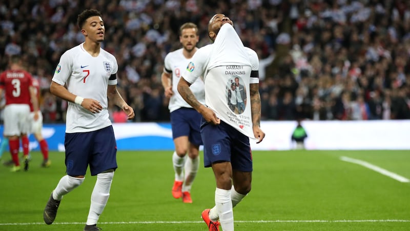 Sterling lifted his jersey to show the tribute to Damary Dawkins after scoring his second goal in England’s match against the Czech Republic.